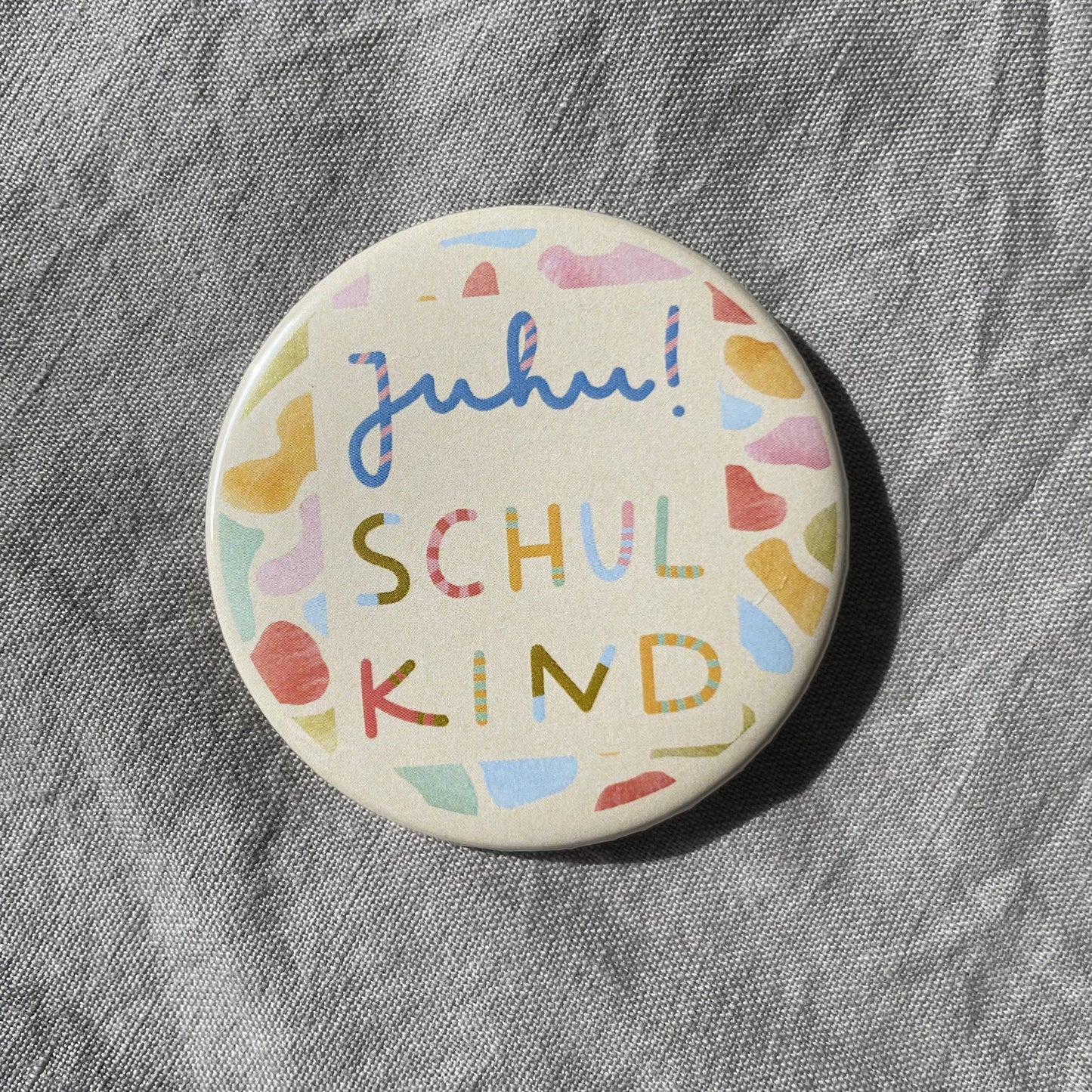 Button "Schulkind", Einschulung