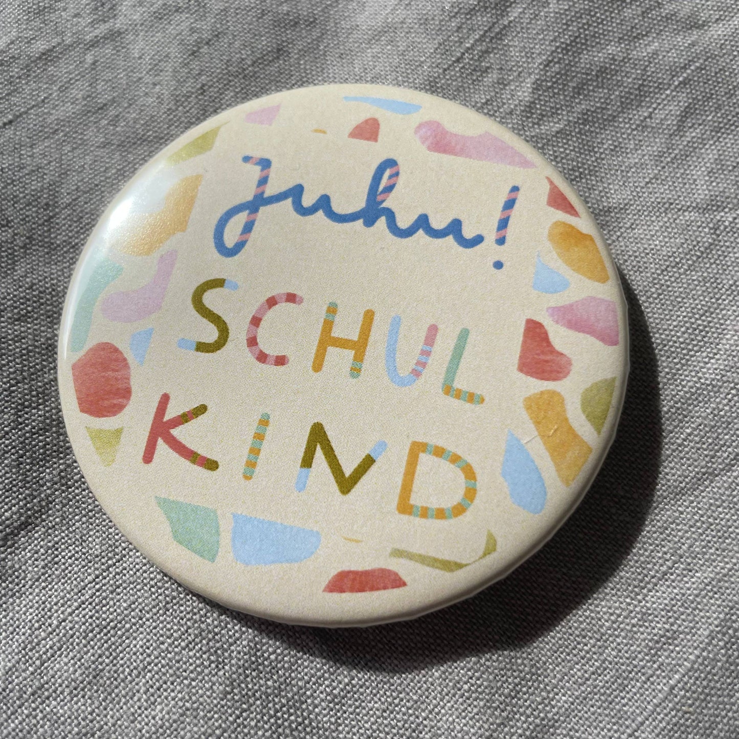 Button "Schulkind", Einschulung